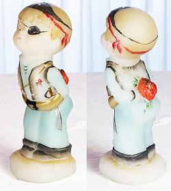 0513872 -  4-3/4'' Milk Glass Boy Figurine named ''Captain Kid'' Michelle K